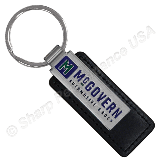 custom Leather Keychains with brushed nickel metal finish. Custom logo diestruck and color filled into the material with a metal split ring to hold keys